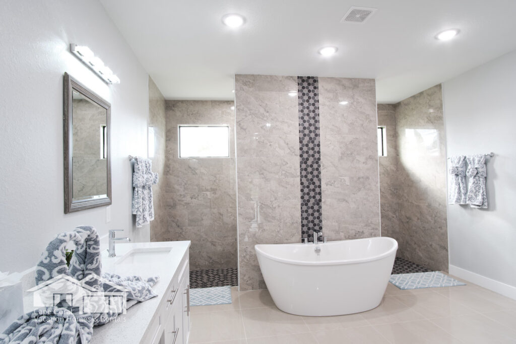 Villa Turtle Bay Master Bathroom Bathtub Sink Towel Swan Shower Cape Coral Florida